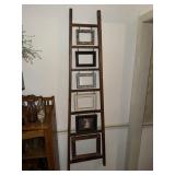 Wooden ladder picture frame display and a
