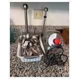 Clear glass canister, wrought iron napkin holder,