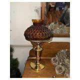 Quilted pattern lamp with amber shade and brass