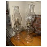 2 Clear glass kerosene lamps (have been converted