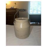 Small stoneware crock with bail handle