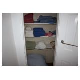 Contents of bathroom closet - blankets (LL Bean),