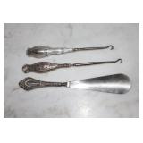 Lot - 2 button hooks (1 marked Sterling on the