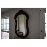 Walnut mirror with intricate hand carving