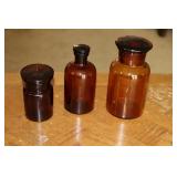 3 brown glass apothecary jars (one marked Baker's