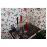Lot - 4 glass hurricanes, glass candlesticks, and