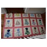 Handmade quilt with Sunbonnet Sue applique