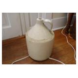Stoneware pottery whiskey jug (handle has crack)
