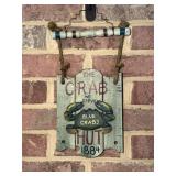 The Crab Hut wooden decorative sign