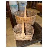 Large and small rattan gathering style baskets