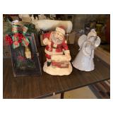 Earthtones Pottery angel, Santa climbing