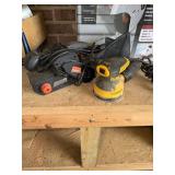 Warrior belt sander and a DeWalt palm sander
