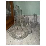 Glass cannister with floral etching,