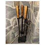 Set of fireplace tools with wooden handles