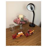 2 Toy fire trucks, desk lamp, candle holder