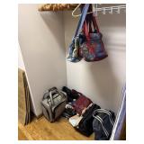 Contents of closet including pocketbooks,