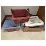 Box lot of place mats and 2 wicker baskets