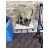 Tile top outdoor patio table with a decorated