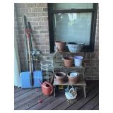 Wooden plant stand, planters, shovels,