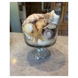 Decorative pedestal bowl filled with