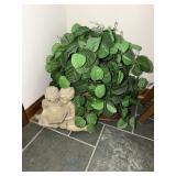 Resin garden ornament with a boy and girl