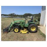 John Deere 955 tractor with 70A bucket attachment
