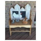 Wooden bench decorated with chicken on