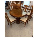 Oak round pedestal table with 6 oak T back
