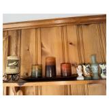 Decorative pillar candle featuring artwork,