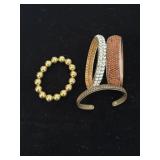 Costume jewelry bracelets - one is copper
