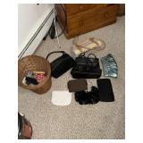 2 Wicker baskets containing pocketbooks and