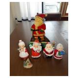 Wooden Santa with ski poles and 2 sets of Santa