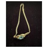 Topaz and clear stone single station bracelet