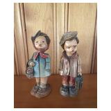 Carved boy and girl figurines made in Holland