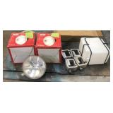 Lights, topper tie down, and water supply tank.