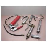 Five Grease Guns