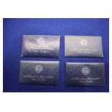 4- Eisenhower Uncirculated Silver Dollars (40%)
