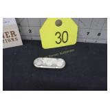 A spring loaded 10 Cent Coin holder