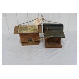 2 large wooden bird houses