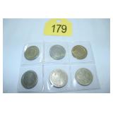 six $1 casino gaming tokens