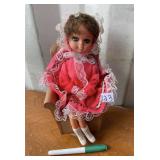 1960'S DOLL ON SPINNING CHAIR