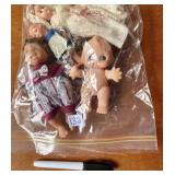 VINTAGE DOLLS UNDER PLASTIC