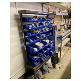 WALL RACK BLUE BINS AND CONTENTS