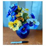 BLUE GLASS VASE AND FLOWERS