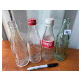4 COCA COLA BOTTLES