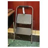 A Cosco 2 Step Folding Stool.