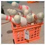 A Crate Of 11 Bowling Pins