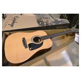 An Epiphone Acoustic Guitar