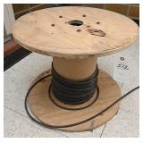 A Partial Roll Of Copper Telephone Wire