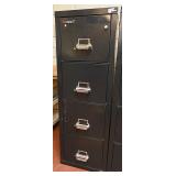 A Fire King 4 Drawer File Cabinet